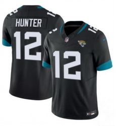 Men Jacksonville Jaguars 12 Travis Hunter Black 2025 Draft F U S E  Vapor Limited Stitched Football Jersey