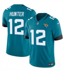 Youth Jacksonville Jaguars 12 Travis Hunter Teal 2025 Draft F U S E  Vapor Limited Stitched Football Jersey